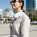 Wearable bladeless neck fan worn around neck for hands-free cooling in UAE summer heat