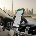 Magnetic car phone mount with iPhone showing navigation in modern UAE car interior